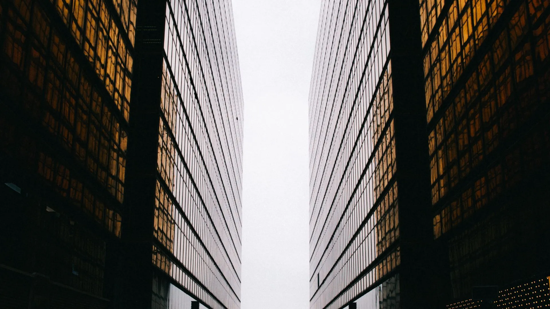 Warm amber-toned symmetrical building facade